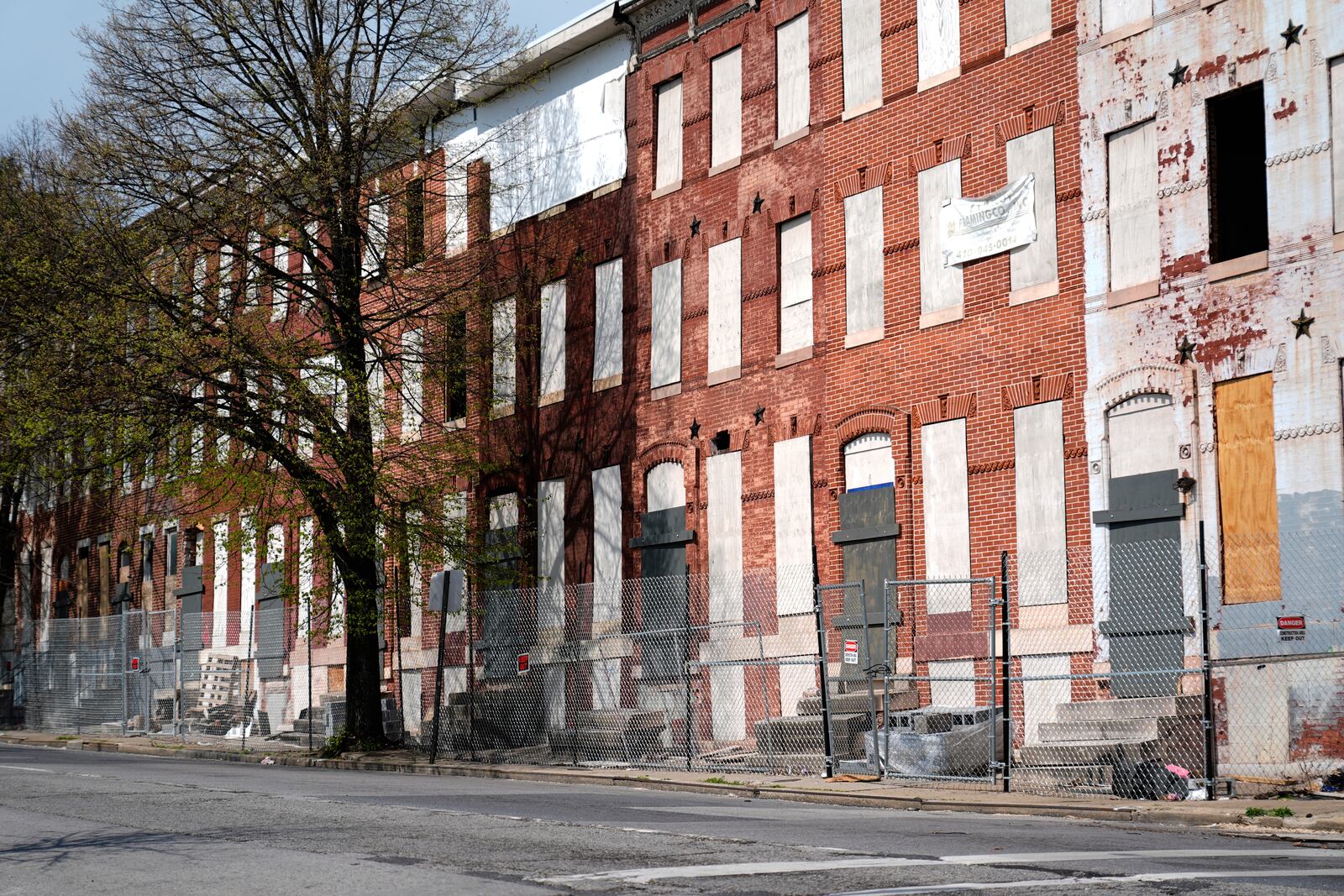 Abandoned row homes are seen in the Sandtown-Winchester neighborhood in Baltimore, Monday, April 14, 2025. (AP Photo/Stephanie Scarbrough)