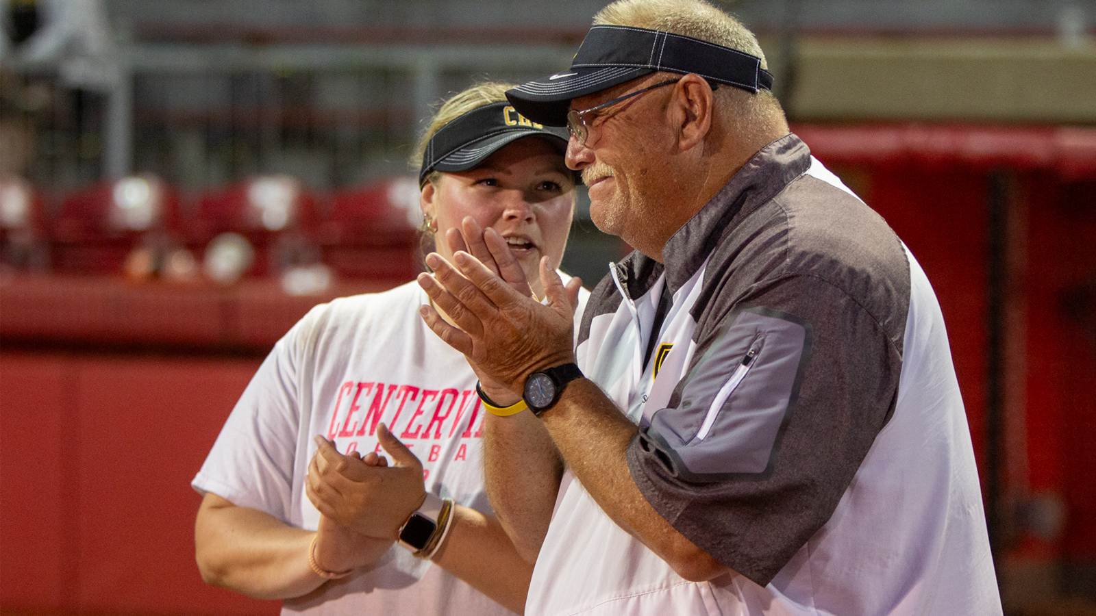Centerville coach Wendell Hutchinson and his daughter and assistant coach Brianna clap for their players as they receive their medals. Jeff Gilbert/CONTRIBUTED
