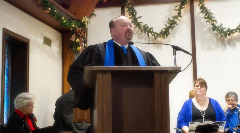 The Rev. John Schlicher of St. Andrew United Methodist Church in Beavercreek, who was headed to the Panama Canal on a cruise with his wife and mother-in-law, stood in the middle of baggage claim when shots rung out. He heard the first shot, and the person to his right collapsed to the ground.