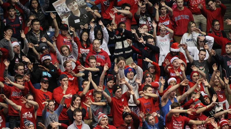 Dayton fans cheer during a game against East Tennessee State on Saturday, Dec. 10, 2016, at UD Arena. David Jablonski/Staff