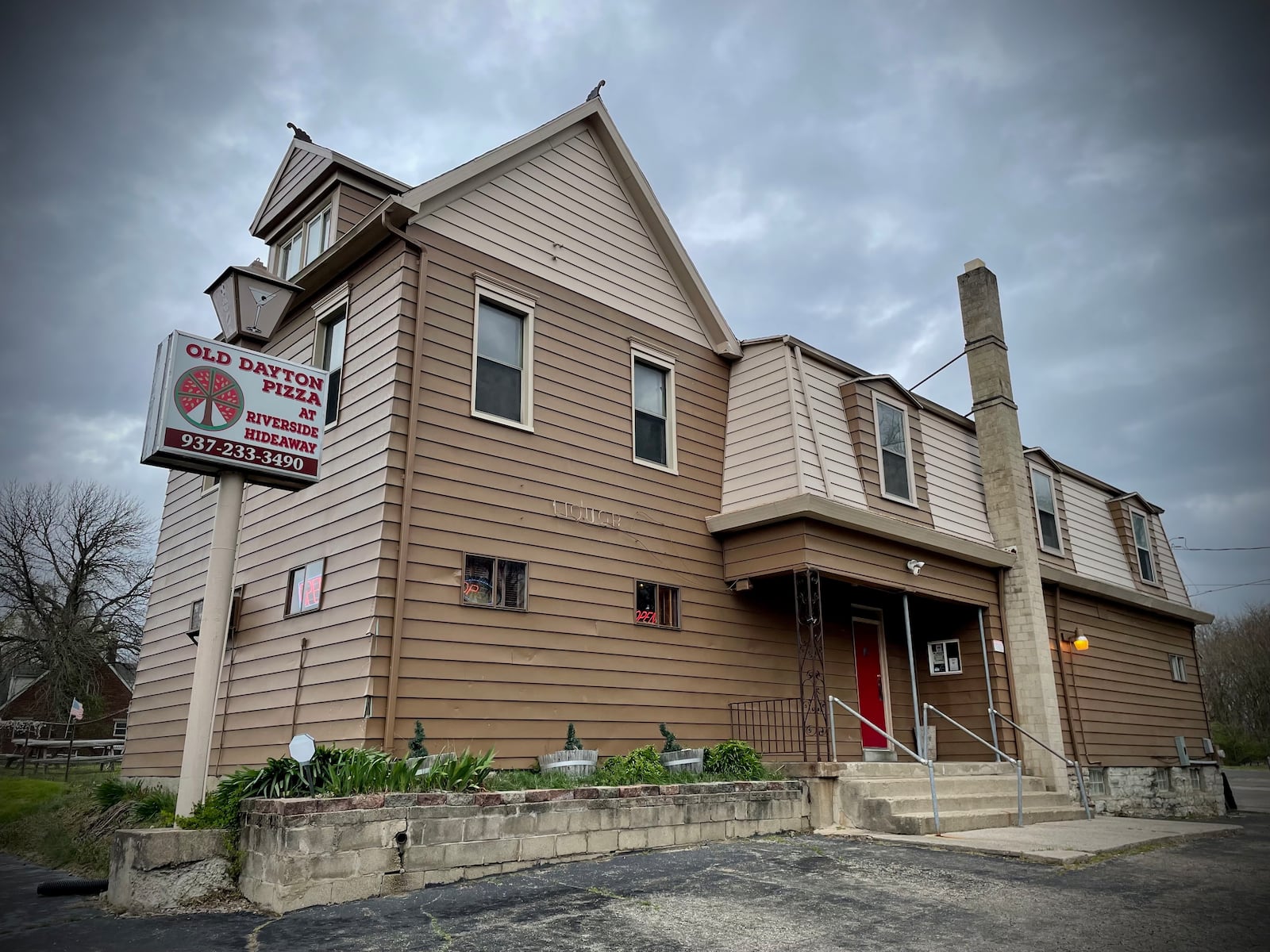 After closing their doors for a month, Owners Sherri and Steve Zelen have reopened Old Dayton Pizza at Riverside Hideaway on Old Troy Pike. NATALIE JONES/STAFF
