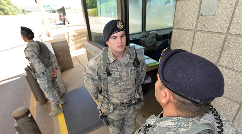 88th SFS installation entry controllers verify requests for visitor entry; issue visitor passes, and enforce the installation traffic code. Entry controllers may search and inspect personnel and vehicles, as directed by higher authority. As Air Force ambassadors, installation entry controllers play a vital role on Air Force installations. (U.S. Air Force photo/Al Bright)