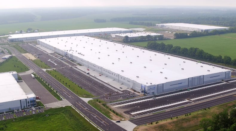 Giant warehouses cover Park North in Monroe where Amazon openly built a million-square-foot distribution center. FILE PHOTO