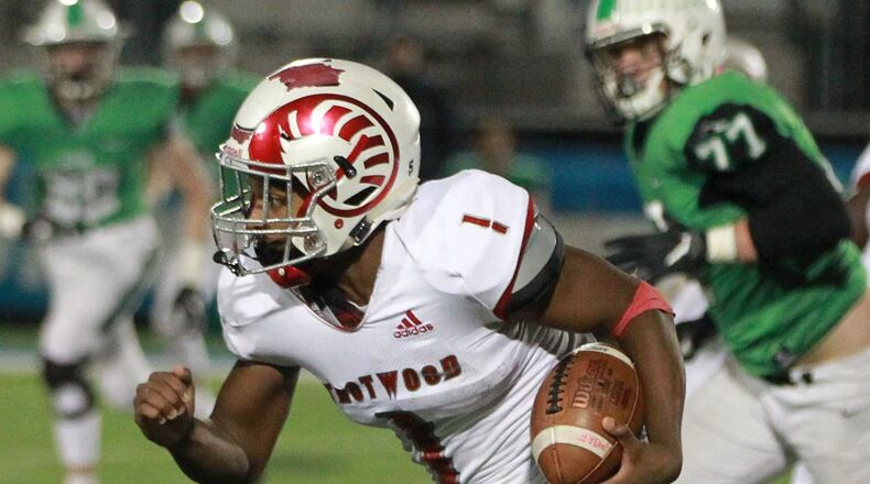 Trotwood QB Keon’tae Huguely takes off. Trotwood-Madison defeated Badin 20-7 in a D-III, Region 12 high school football final at Miamisburg on Friday, Nov. 22, 2019. MARC PENDLETON / STAFF