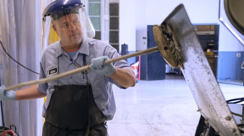 David McBeth, 88th Logistic Readiness Squadron Aerospace Ground Equipment worker, cleans a light cart in the AGE shop on Wright-Patterson Air Force Base Aug. 18, 2017. The 88th LRS is responsible for all the ground equipment used to support visiting aircraft. (U.S. Air Force photo/R.J. Oriez)