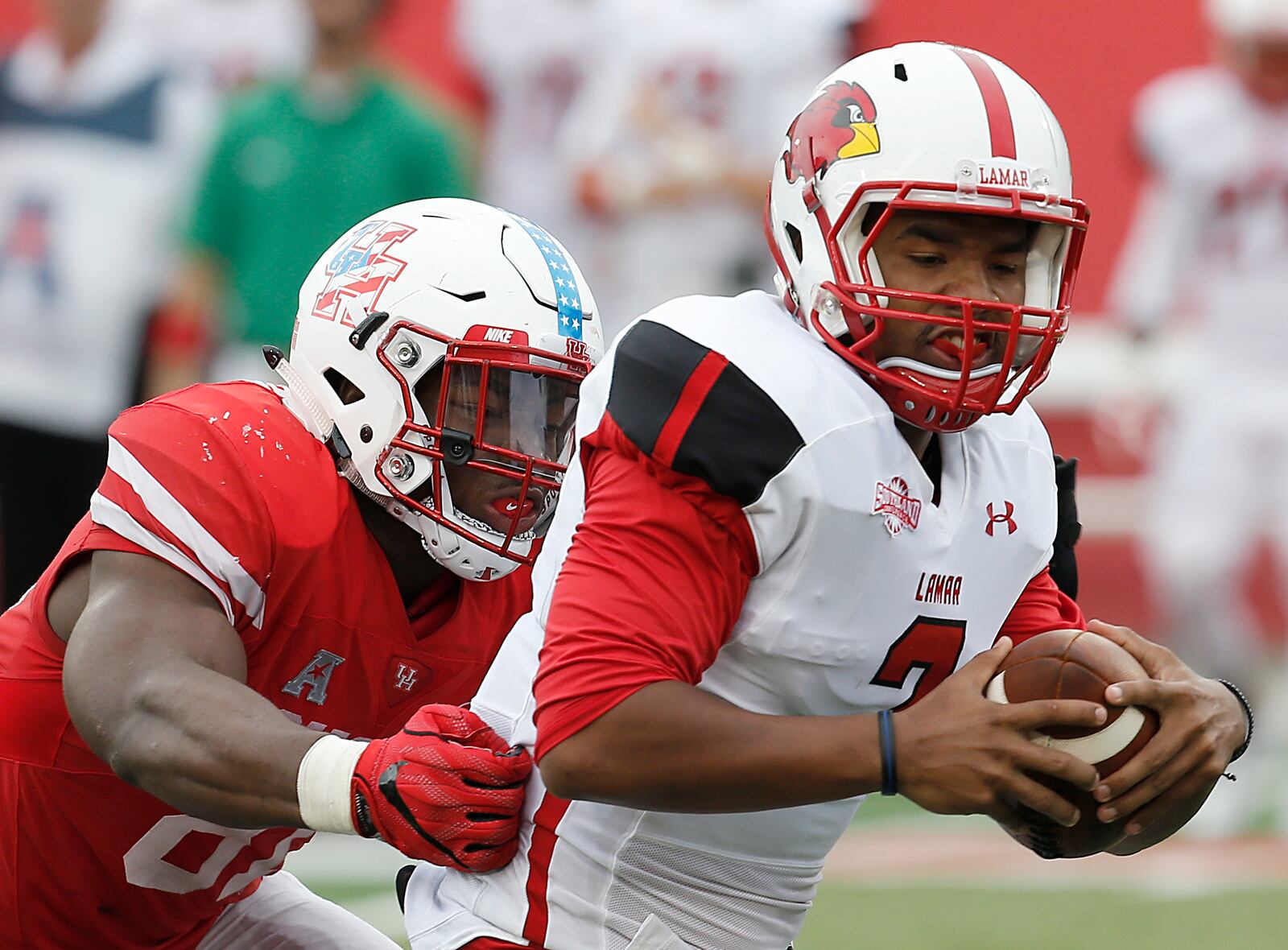 HOUSTON, TX - SEPTEMBER 10: Linebacker Tyus Bowser #81 sacks quarterback Andrew Allen #2 of the Lamar Cardinals of the Houston Cougars in the second half at TDECU Stadium on September 10, 2016 in Houston, Texas. Houston won 42 to 0. (Photo by Thomas B. Shea/Getty Images)