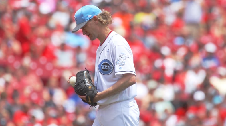 Reds starter Bronson Arroyo reacts after giving up a home run against the Dodgers on Sunday, June 18, 2017, at Great American Ball Park in Cincinnati. David Jablonski/Staff