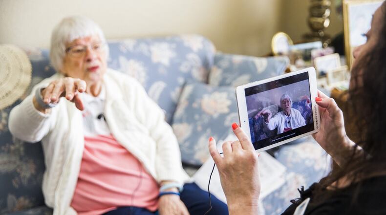 Irene Skurla is interviewed by Vibrant Life Director Lynn Brink, who uses the OneDay app for senior citizens, on Tuesday, July 24, 2018 at The Village at Mapleshade in Plano, Texas. The app allows staff members to interview residents, then send the videos to residents’ family members. (Ashley Landis/Dallas Morning News/TNS)