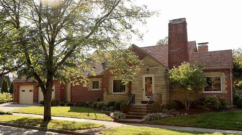 This Cape Cod-style home with about 2,130 sq. ft. of living space has flexible second-floor space with a bedroom, loft sitting room with closet and a full bathroom. The finished basement offers a family room and recreation room with walk-in wine cellar and a potential full bathroom. CONTRIBUTED PHOTO BY KATHY TYLER