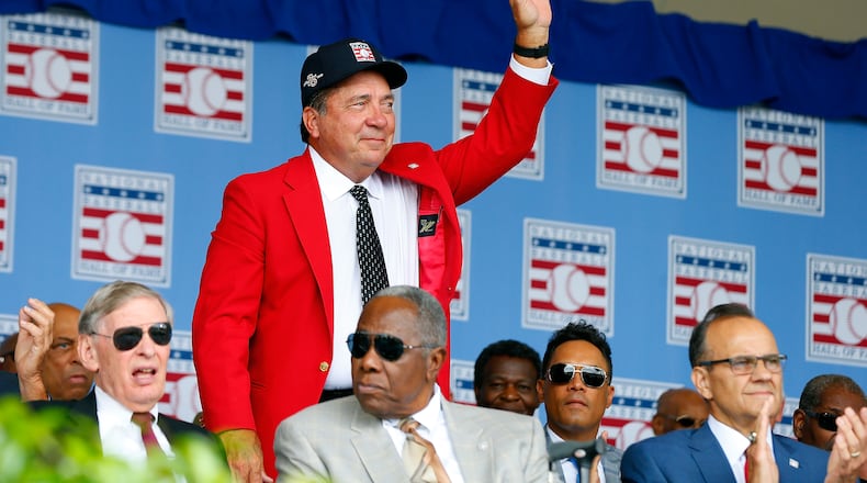 Reds Hall of FamerJohnny Bench is introduced during the Baseball Hall of Fame induction ceremony at Clark Sports Center on July 27, 2014 in Cooperstown, New York.  He was back again this past weekend, with his camera in tow, as former catcher Ivan "Pudge" Rodriguez was one of the latest inductees.