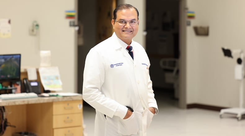 Emmanuel Dsouza has been named a Dayton Daily News Community Gem for his work at Community Health Centers of Greater Dayton, where he is nurse practitioner. BRYANT BILLING / STAFF