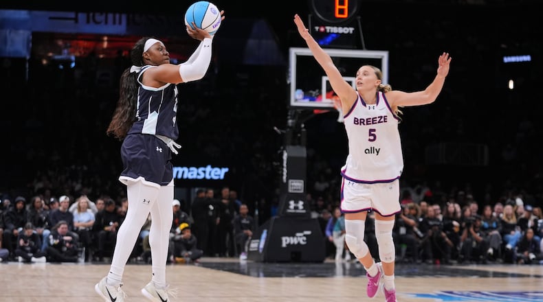 Mist BC wing Arike Ogunbowale (24) shoots over Breeze BC guard Paige Bueckers (5) during the second half of a semifinal in an Unrivaled 3-on-3 basketball game, Monday, March 2, 2026, in New York. (AP Photo/Frank Franklin II)