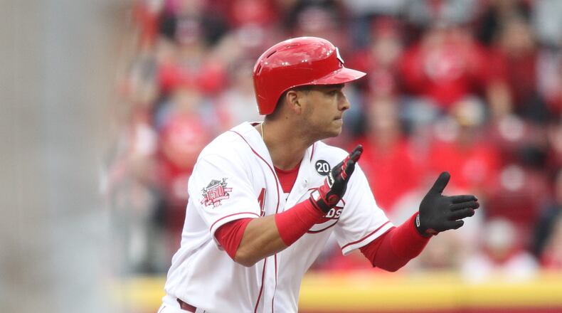 The Reds’ Jose Iglesias reacts after a double in the seventh inning against the Pirates on Opening Day on Thursday, March 28, 2019, at Great American Ball Park in Cincinnati. David Jablonski/Staff