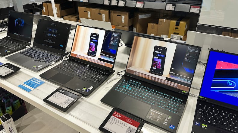 FILE - Laptop computers are displayed at a retail store in Vernon Hills, Ill., Thursday, Aug. 7, 2025. (AP Photo/Nam Y. Huh, File)