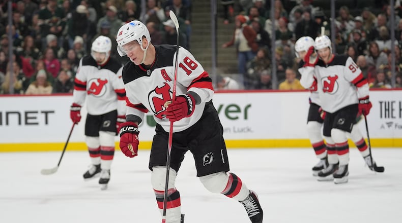 New Jersey Devils left wing Ondrej Palat (18) skates after scoring during the second period of an NHL hockey game against the Minnesota Wild, Monday, Jan. 12, 2026, in St. Paul, Minn. (AP Photo/Abbie Parr)