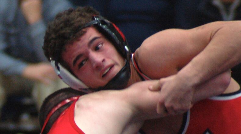 Fairfield’s Zach Shupp looks for an opening to attack LaSalle’s Lucas Byrd during their 106-pound title match at the Division I district tournament at Fairmont’s Trent Arena Saturday night. JOHN CUMMINGS / CONTRIBUTED