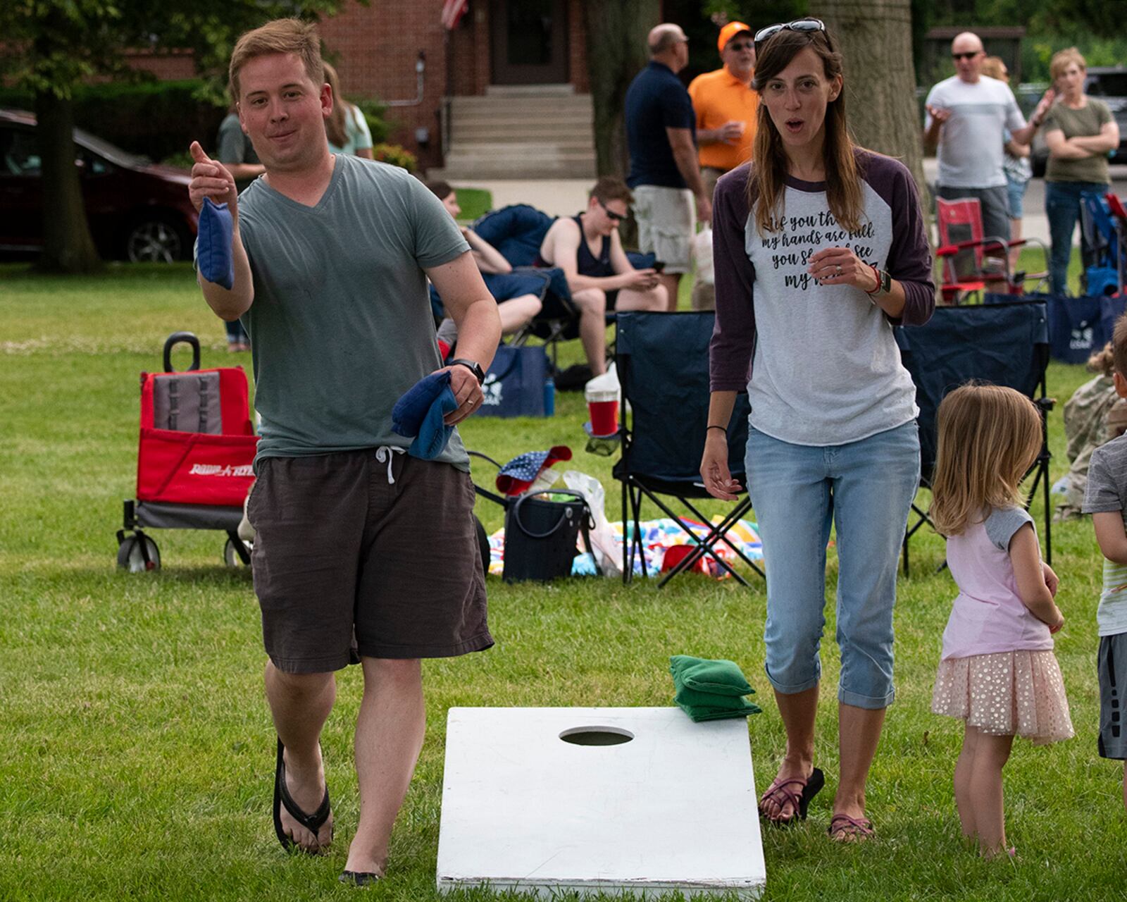 Maj. Jacob Collie and his wife, Tanya, play cornhole at a block party sponsored by the 88th Force Support Squadron on June 24 at Turtle Pond in Wright-Patterson Air Force Base’s Brick Quarters historic district. U.S. AIR FORCE PHOTO/R.J. ORIEZ
