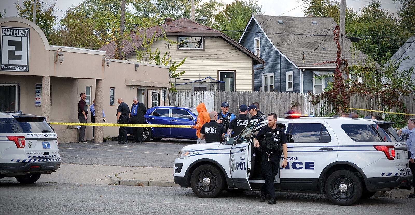 Dayton police are investigating a shooting at the FamFirst Barber Shop Thursday afternoon, Oct. 21, 2021, after two gunshot victims arrived at Kettering Health Dayton. MARSHALL GORBY/STAFF