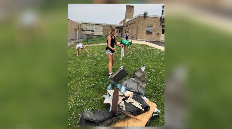 Students took part in the cleanup throughout the city of Brookville. CONTRIBUTED