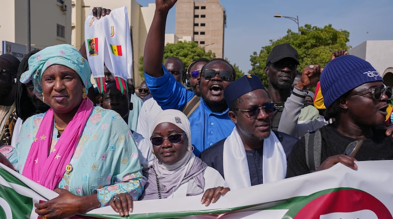 Protesters take to the streets to demonstrate against homosexuality in Dakar, Senegal, Friday, March 6, 2026. (AP Photo/Misper Apawu)