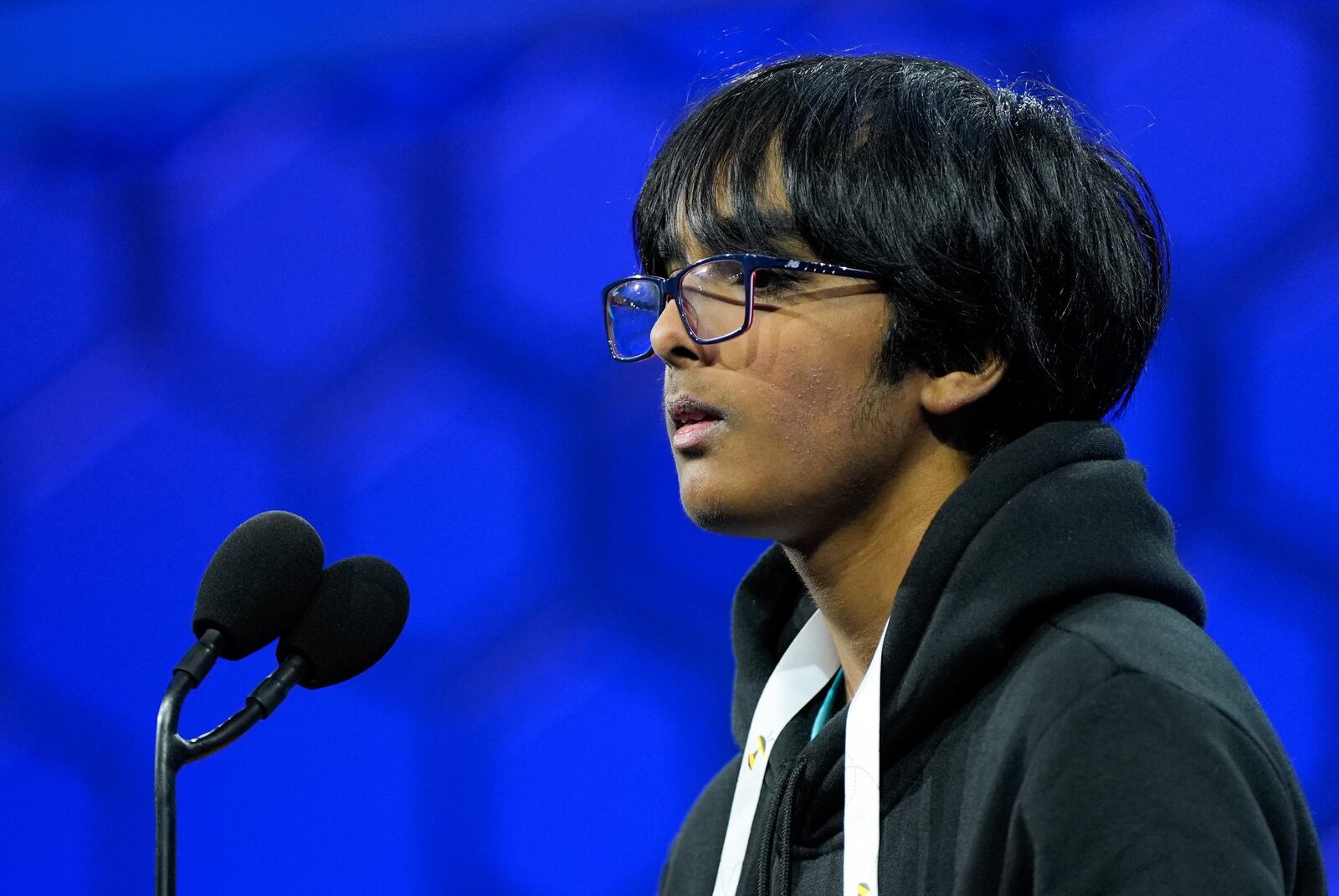 Faizan Saki, 13, of Dallas, Texas, competes during the quarterfinals of the Scripps National Spelling Bee, Wednesday, May 28, 2025, in Oxon Hill, Md. (AP Photo/Julia Demaree Nikhinson)