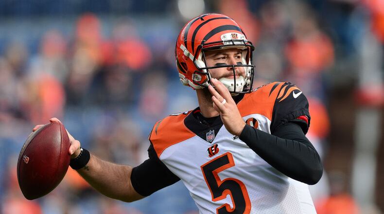 DENVER, CO - NOVEMBER 19: Quarterback AJ McCarron #5 of the Cincinnati Bengals throws as he warms up before a game against the Denver Broncos at Sports Authority Field at Mile High on November 19, 2017 in Denver, Colorado. (Photo by Dustin Bradford/Getty Images)