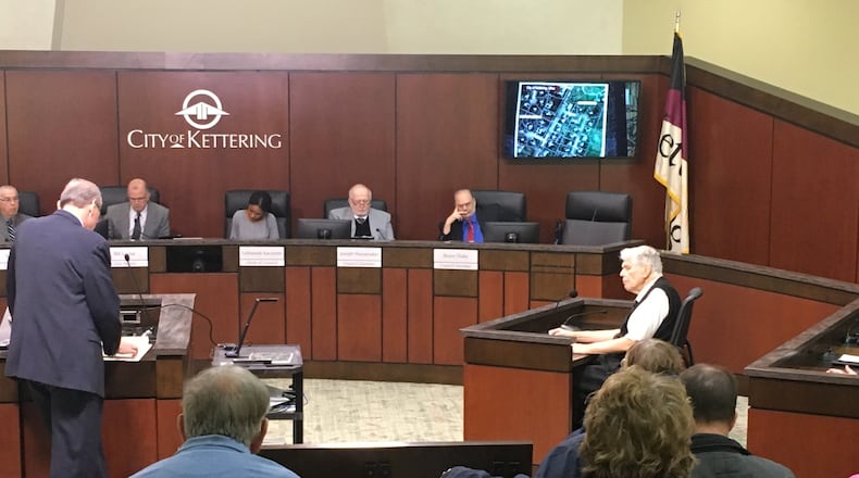 Kettering is reversing Board of Zoning Appeals denial of a radio tower variance for a resident, Wynn Rollert, who plans to erect a 50-foot tower on his property in the 4800 block of Mad River Road. Rollert is shown testifying before council, which heard his appeal regarding the zoning denial.