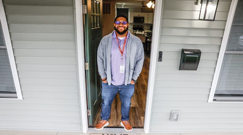 Bradley Kuykendall purchased his Dayton home in May amid a home sales market that has seen the median home sales prices more than doubled in the past decade. JIM NOELKER/STAFF