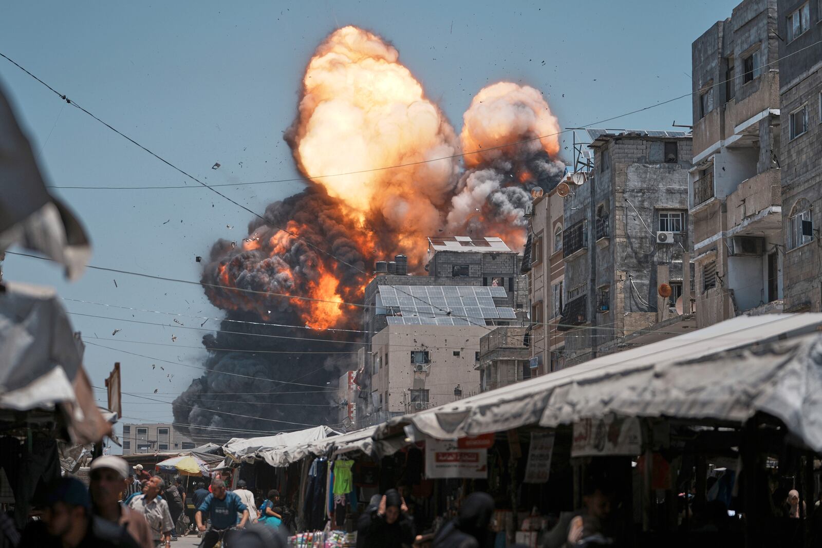 Thick smoke and flames erupt from an Israeli airstrike in Gaza City, Sunday, June 1, 2025. (AP Photo/Jehad Alshrafi)