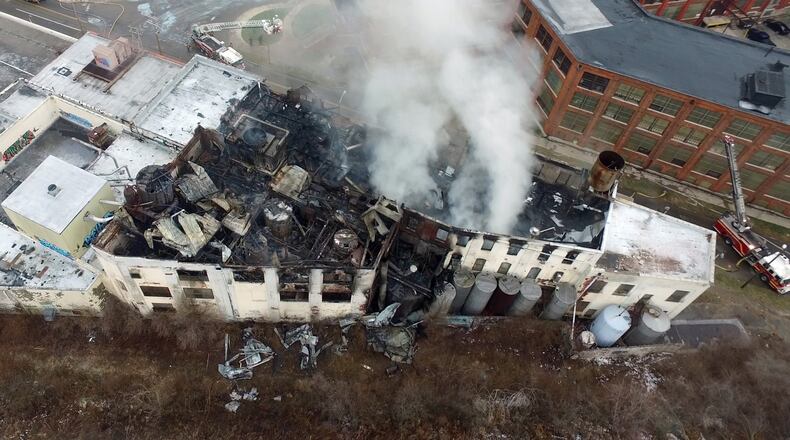 The former Hewitt Soap Factory burned overnight on Thursday. The factory is located on Linden Ave. in east Dayton. TY GREENLEES / STAFF