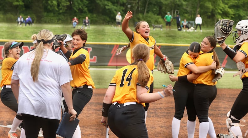 Centerville celebrates after a victory against Mason in a Division I regional semifinal on Wednesday, May 28, 2025, at Indian Hill High School. David Jablonski/Staff