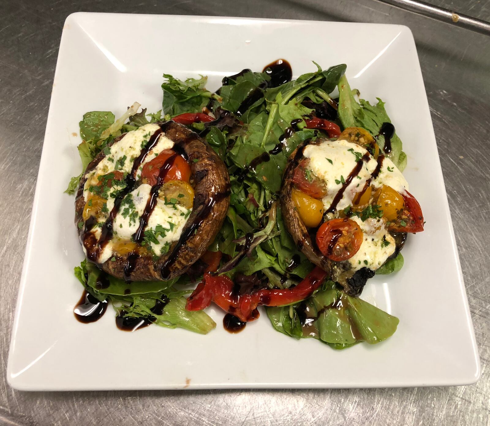 Dayton Club's winter 2019 menu.  Pictured: Carrilon Caprese Portobello