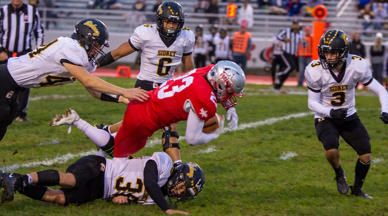 Troy running back Nick Kawecki dives for extra yardage against Sidney during the first half on Thursday, Sept. 23, 2021, in Troy. Photo by Jeff Gilbert