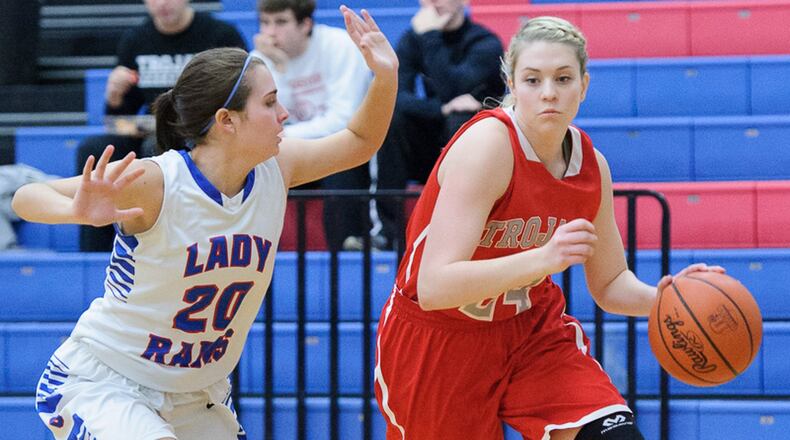 Southeastern senior forward Jessica Erwin (dribbles with pressure from Greeneviewâs Sabrina Saunders. Erwin was named second team All-Ohio. Contributed Photo by Bryant Billing