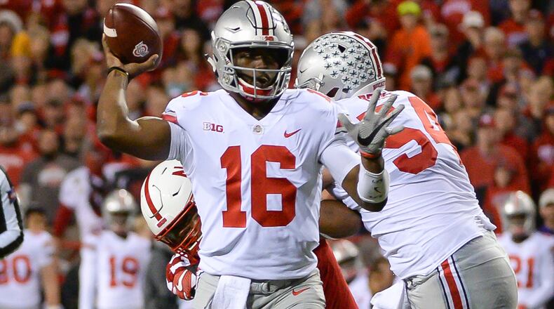 LINCOLN, NE - OCTOBER 14: Quarterback J.T. Barrett #16 of the Ohio State Buckeyes throws against the Nebraska Cornhuskers at Memorial Stadium on October 14, 2017 in Lincoln, Nebraska. (Photo by Steven Branscombe/Getty Images)