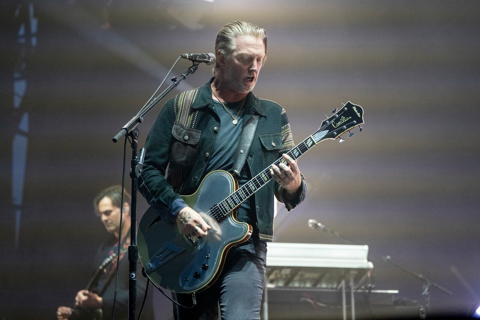 Josh Homme of Queens of the Stone Age performs during the Louder Than Life Music Festival on Sunday, Sept. 24, 2023, at Highland Festival Grounds in Louisville, Ky. (Photo by Amy Harris/Invision/AP)