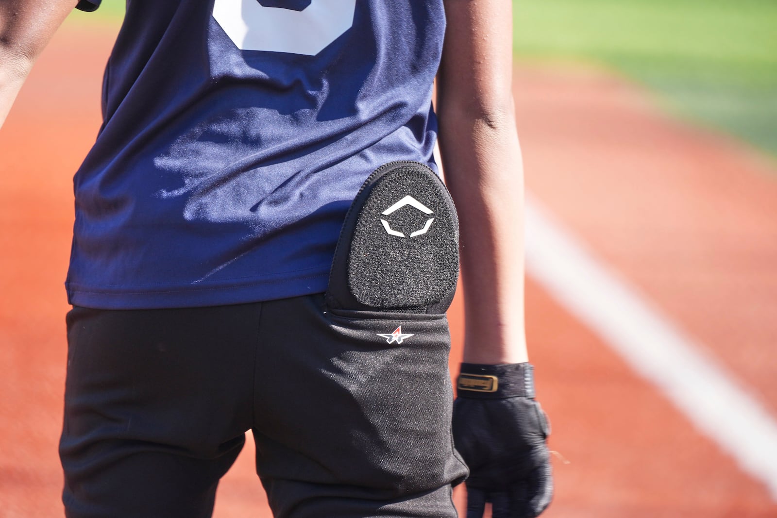 Youth ballplayer Josiah Jones bats during youth baseball game in Monroeville, Pa., with his sliding matt in his back pocket on April 27, 2025. (AP Photo/Gene J. Puskar)