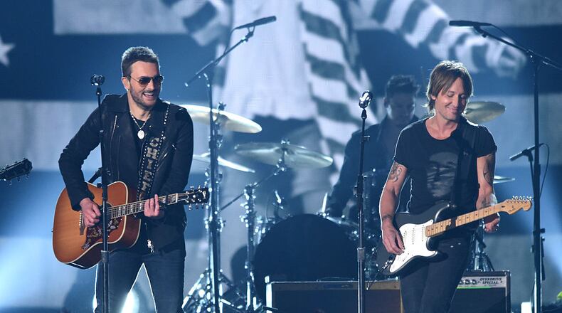 ARLINGTON, TX - APRIL 19: Singer-songwriters Eric Church (L) and Keith Urban perform onstage during the 50th Academy of Country Music Awards at AT&T Stadium on April 19, 2015 in Arlington, Texas. (Photo by Cooper Neill/Getty Images for dcp)