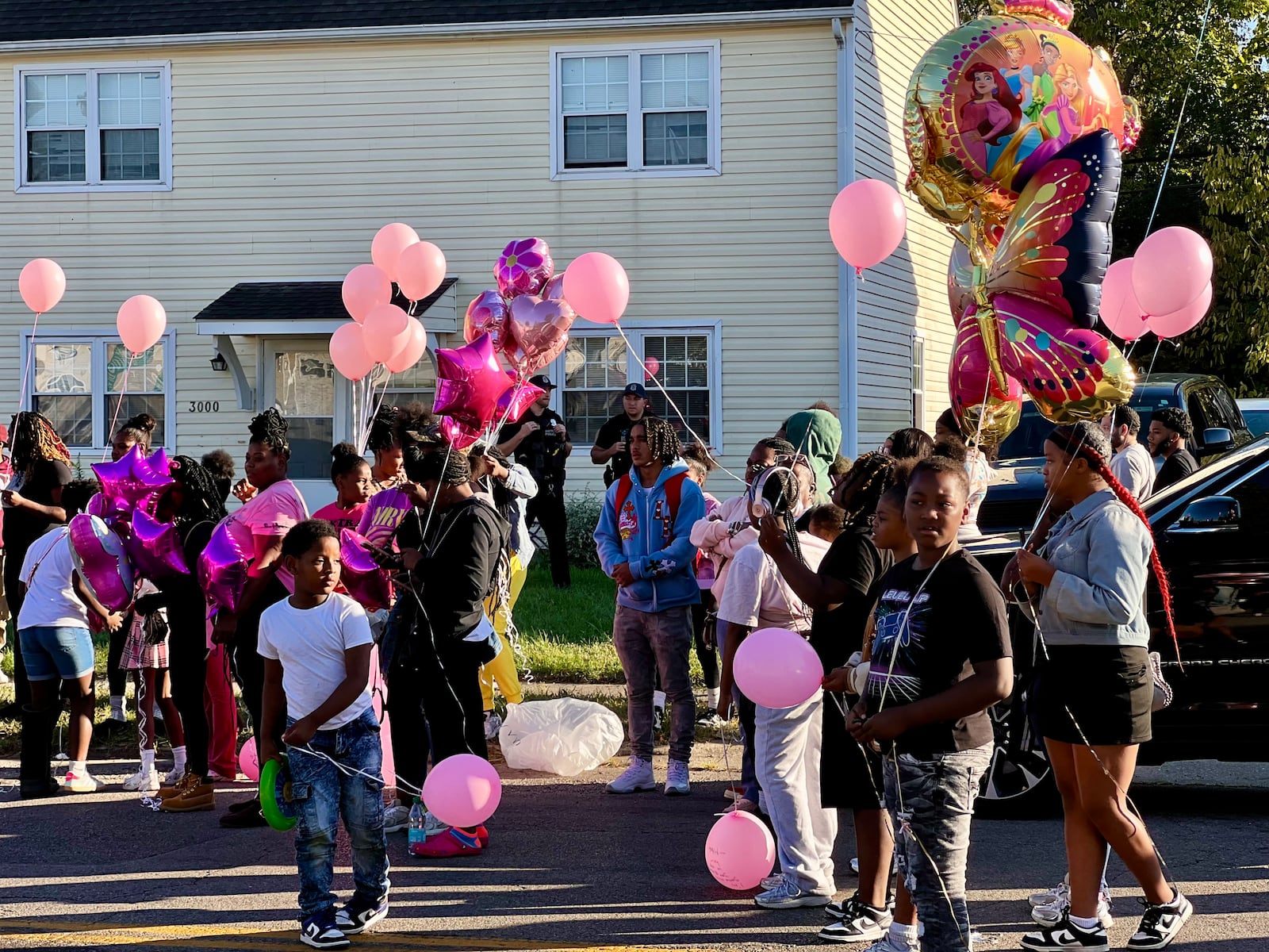 Hundreds of balloons were released on Sunday in honor of 5-year-old Legaci Deshawn Taylor, who was killed in a shooting in Dayton.