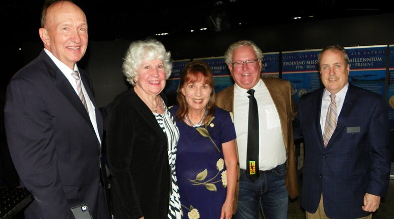 Retired U.S. Air Force Capt. Guy Gruters and his wife, Sandy; U.S. Army Capt. Carolyn Auclair; Jim White, president of the Dayton Area Ford Dealers Association; and Mike Imhoff, executive director of the Air Force Museum Foundation, attend a Ford Oval of Honor event June 21 honoring Auclair, Gruters and retired U.S. Air Force Lt. Col. Mike Jackson. (Contributed photo)