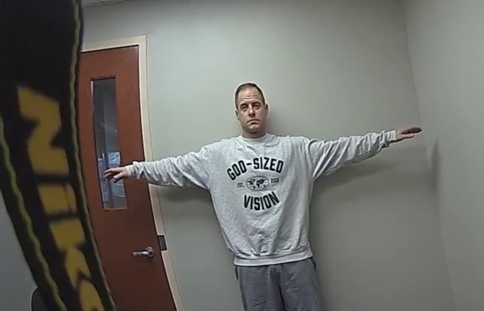 Caleb Flynn is photographed by an officer as part of evidence collection. TIPP CITY POLICE