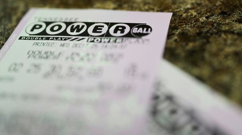 Powerball lottery tickets are seen Wednesday, Dec. 17, 2025, in Nashville, Tenn. (AP Photo/George Walker IV)
