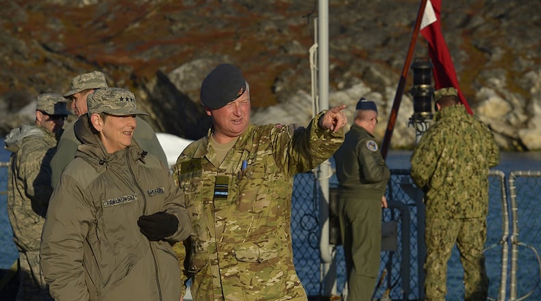 Maj. Gen. Kim Jesper Jorgensen, commander Joint Arctic Command gives Gen. Ellen Pawlikowski, the commander of Air Force Material Command, and other Air Force senior leaders a tour of one the ships under his command in Illulissat, Greenland, Sept. 12. The senior leaders were in Greenland, Canada and Alaska, as part of Operation Uggianaqtuq, an Arctic Expedition to better understand the challenges of working in the region and to build relationships with allies and partners there. (U.S. Air Force photo/Tech. Sgt. Dan DeCook)