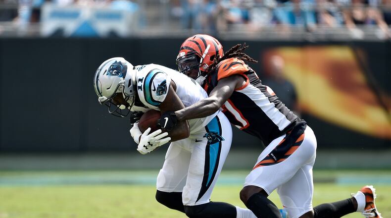 Torrey Smith #11 of the Carolina Panthers runs the ball against Dre Kirkpatrick #27 of the Cincinnati Bengals in the first quarter during their game at Bank of America Stadium on September 23, 2018 in Charlotte, North Carolina. (Photo by Grant Halverson/Getty Images)
