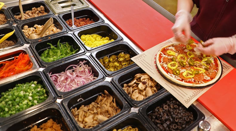 Rapid Fired Pizza is opening inside the Austin Landing Kroger. BILL LACKEY/STAFF