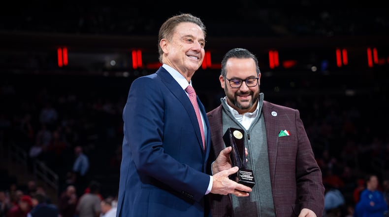 St. John's head coach Rick Pitino receives an award from the Italian Heritage Society of Long Island before an NCAA college basketball game against Xavier, Monday, Feb. 9, 2026, in New York. (AP Photo/Angelina Katsanis)