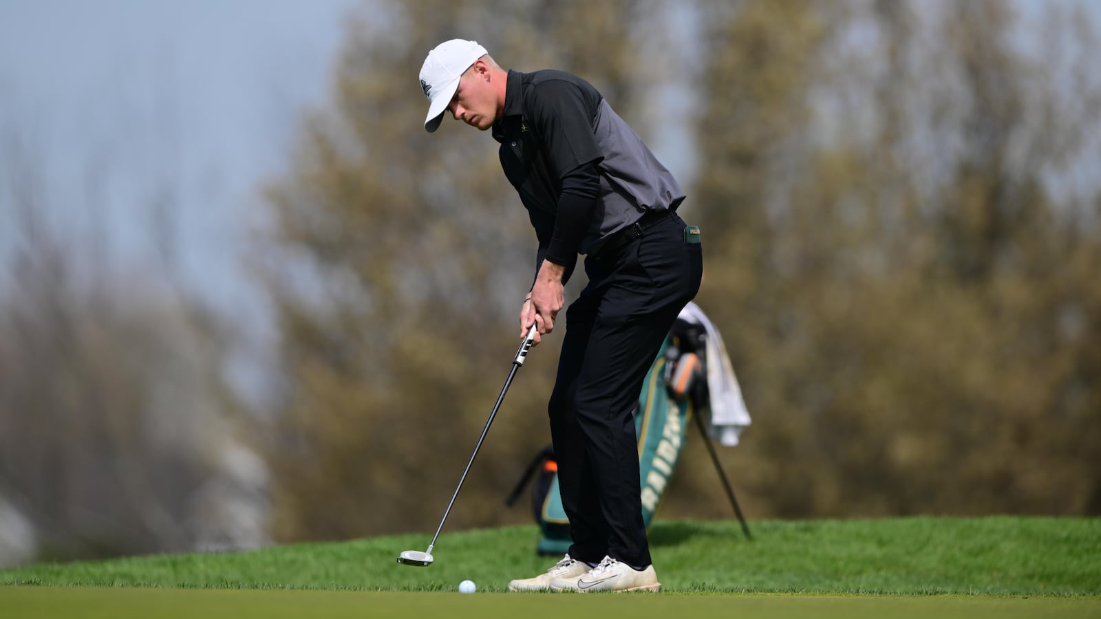 Wright State University golfer Shane Ochs competes in the Wright State University Invitational on April 13 at Heatherwoode Golf Club in Springboro. Andrew Craven/CONTRIBUTED PHOTO