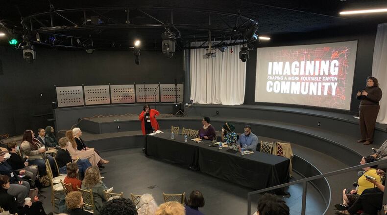 On the first day of the Imagining Community Symposium last year, moderator Daria Graham and Sinclair Community College professors Furaha Henry-Jones, Amaha Sellassie and Faheem Curtis-Khidr discuss how to shape a more equitable Dayton. FILE PHOTO