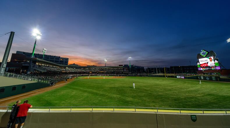 The Dayton Dragons played their home opener on Tuesday, Apr. 11, 2023 at Day Air Ballpark in downtown Dayton to a sellout crowd of 8,135, extending the team’s streak to 1,442 games, an all-time record for professional sports franchises. The Dragons lost to the Great Lakes Loons 9-7. Did we spot you there? TOM GILLIAM/CONTRIBUTING PHOTOGRAPHER