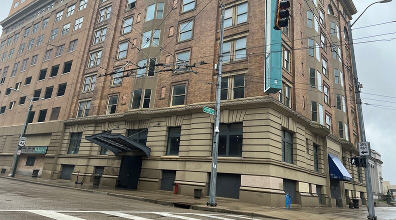 The former Dayton Grand Hotel at 11 S. Ludlow St. in downtown. CORNELIUS FROLIK / STAFF